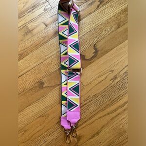 Pink and green purse strap
